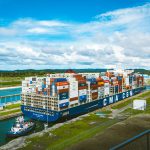 cargo ship traversing panama canal